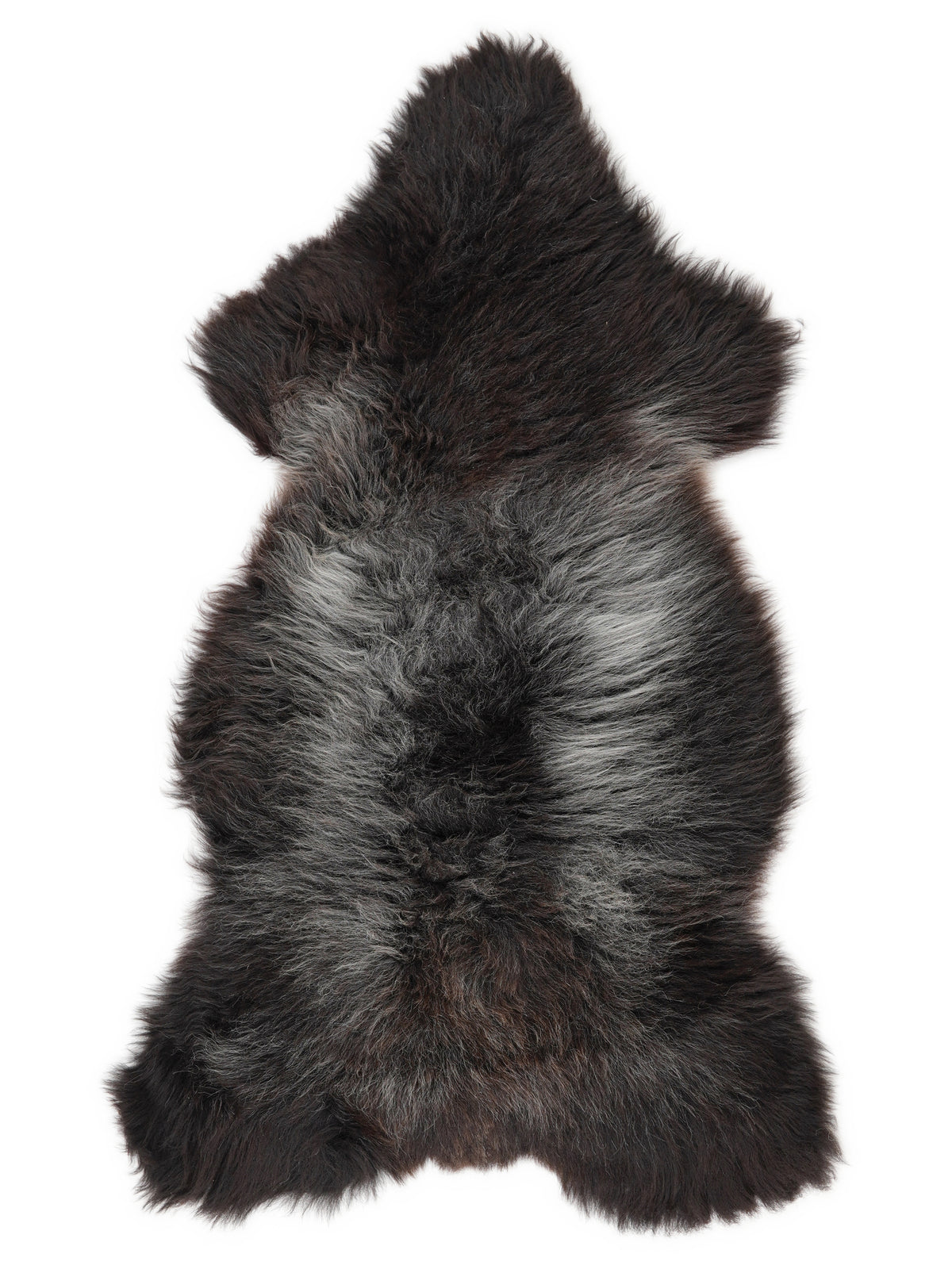 British multicolour sheepskin rug of about 125 × 60 cm, seen from above: the exact sheepskin you receive
