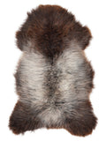 British multicolour sheepskin rug of about 130 × 70 cm, seen from above: the exact sheepskin you receive