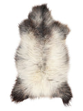 British multicolour sheepskin rug of about 130 × 65 cm, seen from above: the exact sheepskin you receive