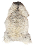 British multicolour sheepskin rug of about 130 × 70 cm, seen from above: the exact sheepskin you receive