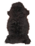 British multicolour sheepskin rug of about 125 × 60 cm, seen from above: the exact sheepskin you receive
