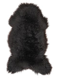 British multicolour sheepskin rug of about 120 × 60 cm, seen from above: the exact sheepskin you receive