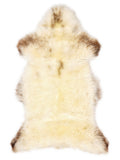 British multicolour sheepskin rug of about 120 × 65 cm, seen from above: the exact sheepskin you receive