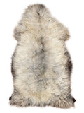 British multicolour sheepskin rug of about 140 × 75 cm, seen from above: the exact sheepskin you receive