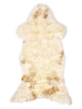 British multicolour sheepskin rug of about 120 × 55 cm, seen from above: the exact sheepskin you receive