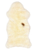British multicolour sheepskin rug of about 125 × 60 cm, seen from above: the exact sheepskin you receive