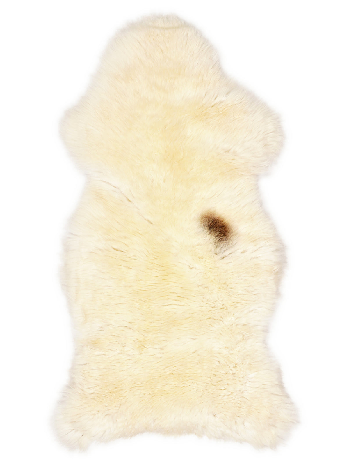 British multicolour sheepskin rug of about 125 × 60 cm, seen from above: the exact sheepskin you receive