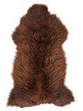 Brown sheepskin rug of about 130 × 65 cm, seen from above: the exact sheepskin you receive