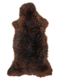 Brown sheepskin rug of about 135 × 60 cm, seen from above: the exact sheepskin you receive