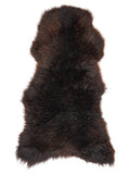 Brown sheepskin rug of about 125 × 60 cm, seen from above: the exact sheepskin you receive