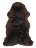 Brown sheepskin rug of about 120 × 60 cm, seen from above: the exact sheepskin you receive