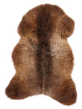 British multicolour sheepskin rug of about 110 × 65 cm, seen from above: the exact sheepskin you receive