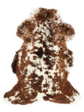 British multicolour sheepskin rug of about 110 × 65 cm, seen from above: the exact sheepskin you receive