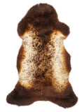 British multicolour sheepskin rug of about 110 × 50 cm, seen from above: the exact sheepskin you receive