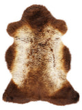 British multicolour sheepskin rug of about 100 × 60 cm, seen from above: the exact sheepskin you receive