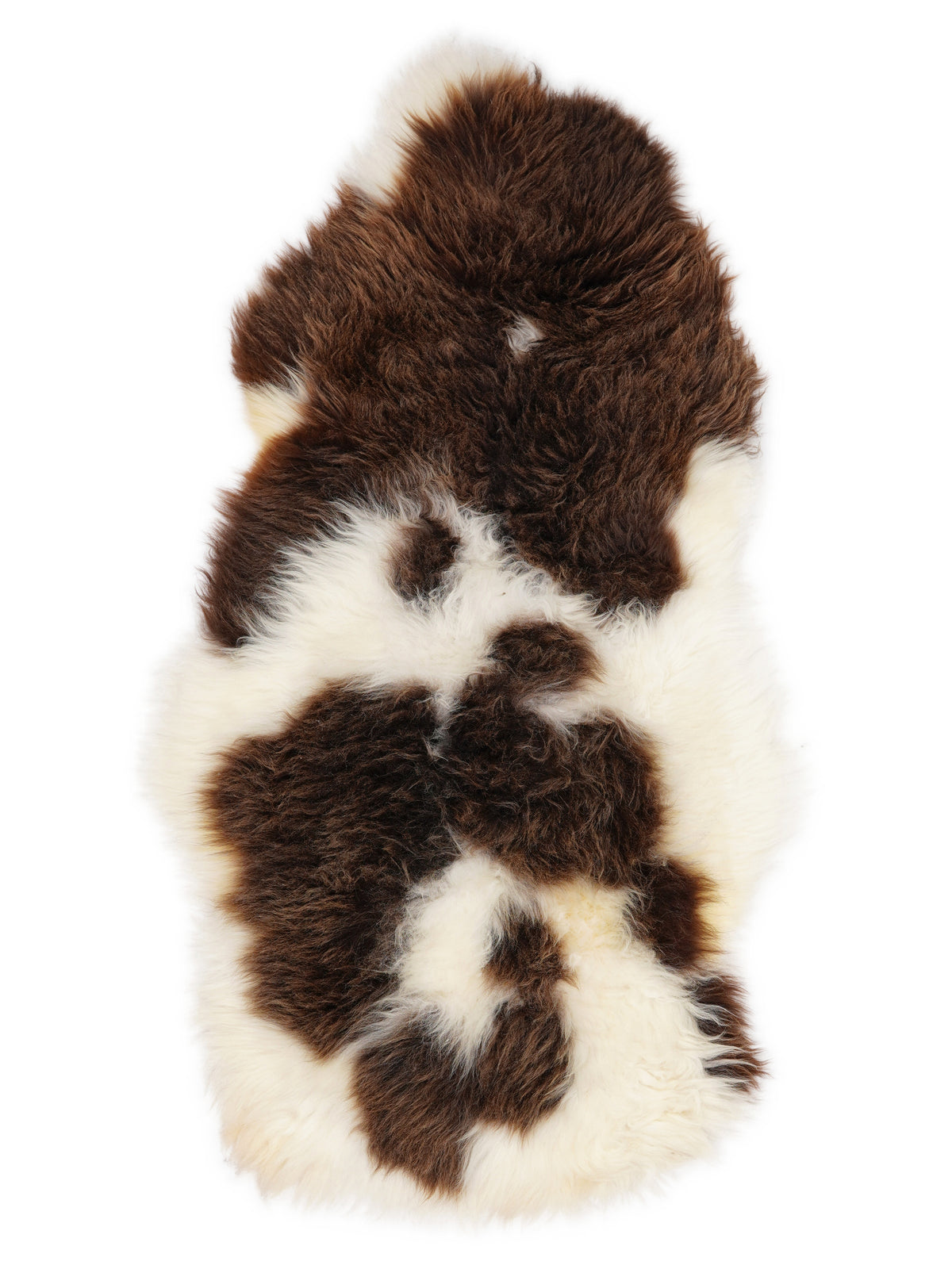 British multicolour sheepskin rug of about 115 × 65 cm, seen from above: the exact sheepskin you receive