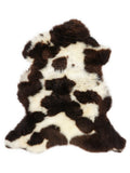British multicolour sheepskin rug of about 100 × 65 cm, seen from above: the exact sheepskin you receive