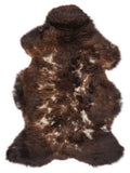 British multicolour sheepskin rug of about 100 × 65 cm, seen from above: the exact sheepskin you receive
