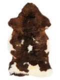 British multicolour sheepskin rug of about 105 × 60 cm, seen from above: the exact sheepskin you receive
