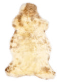 British multicolour sheepskin rug of about 110 × 60 cm, seen from above: the exact sheepskin you receive