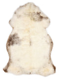 British multicolour sheepskin rug of about 130 × 80 cm, seen from above: the exact sheepskin you receive