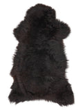 British multicolour sheepskin rug of about 125 × 65 cm, seen from above: the exact sheepskin you receive