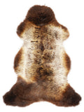 British multicolour sheepskin rug of about 105 × 65 cm, seen from above: the exact sheepskin you receive