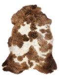 British multicolour sheepskin rug of about 100 × 60 cm, seen from above: the exact sheepskin you receive