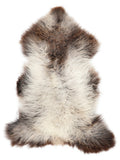 British multicolour sheepskin rug of about 130 × 70 cm, seen from above: the exact sheepskin you receive