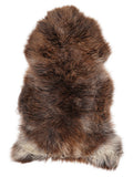 British multicolour sheepskin rug of about 130 × 70 cm, seen from above: the exact sheepskin you receive