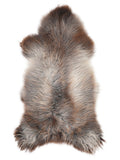 British multicolour sheepskin rug of about 130 × 65 cm, seen from above: the exact sheepskin you receive
