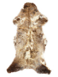 British multicolour sheepskin rug of about 130 × 55 cm, seen from above: the exact sheepskin you receive