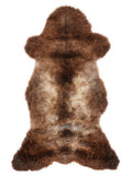 British multicolour sheepskin rug of about 115 × 50 cm, seen from above: the exact sheepskin you receive