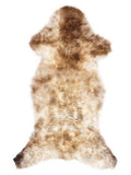 British multicolour sheepskin rug of about 120 × 50 cm, seen from above: the exact sheepskin you receive