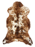 British multicolour sheepskin rug of about 120 × 60 cm, seen from above: the exact sheepskin you receive