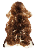 British multicolour sheepskin rug of about 120 × 60 cm, seen from above: the exact sheepskin you receive