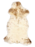 British multicolour sheepskin rug of about 115 × 55 cm, seen from above: the exact sheepskin you receive