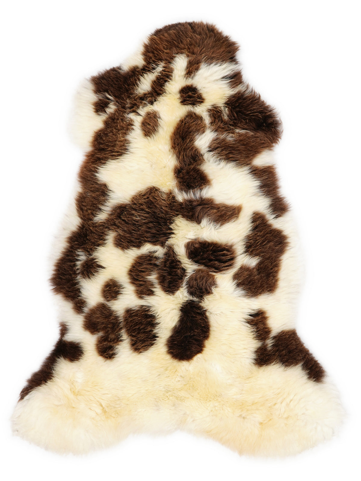 British multicolour sheepskin rug of about 100 × 55 cm, seen from above: the exact sheepskin you receive