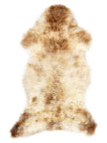 British multicolour sheepskin rug of about 115 × 55 cm, seen from above: the exact sheepskin you receive