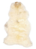 British multicolour sheepskin rug of about 110 × 60 cm, seen from above: the exact sheepskin you receive
