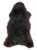 British multicolour sheepskin rug of about 115 × 55 cm, seen from above: the exact sheepskin you receive