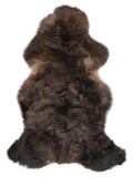 British multicolour sheepskin rug of about 110 × 60 cm, seen from above: the exact sheepskin you receive