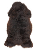 British multicolour sheepskin rug of about 110 × 60 cm, seen from above: the exact sheepskin you receive