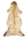 British multicolour sheepskin rug of about 130 × 55 cm, seen from above: the exact sheepskin you receive