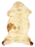 British multicolour sheepskin rug of about 115 × 60 cm, seen from above: the exact sheepskin you receive