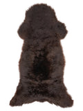 Brown sheepskin rug of about 130 × 55 cm, seen from above: the exact sheepskin you receive
