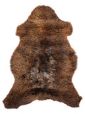 Brown sheepskin rug of about 100 × 65 cm, seen from above: the exact sheepskin you receive