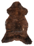Brown sheepskin rug of about 120 × 60 cm, seen from above: the exact sheepskin you receive