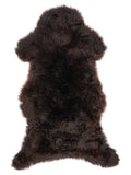 Brown sheepskin rug of about 120 × 60 cm, seen from above: the exact sheepskin you receive