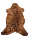 Brown sheepskin rug of about 110 × 60 cm, seen from above: the exact sheepskin you receive